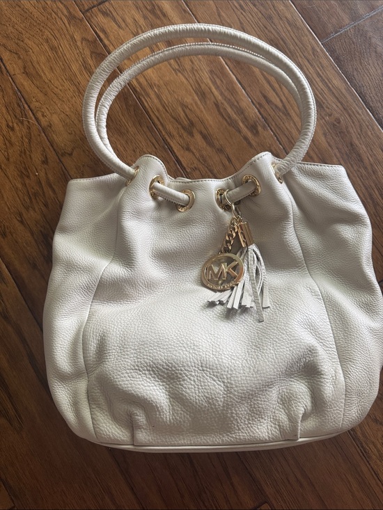 Michael Kors Handbags - Michael Kors Cream Pebbled Leather Drawstring Hobo with Gold Hardware
